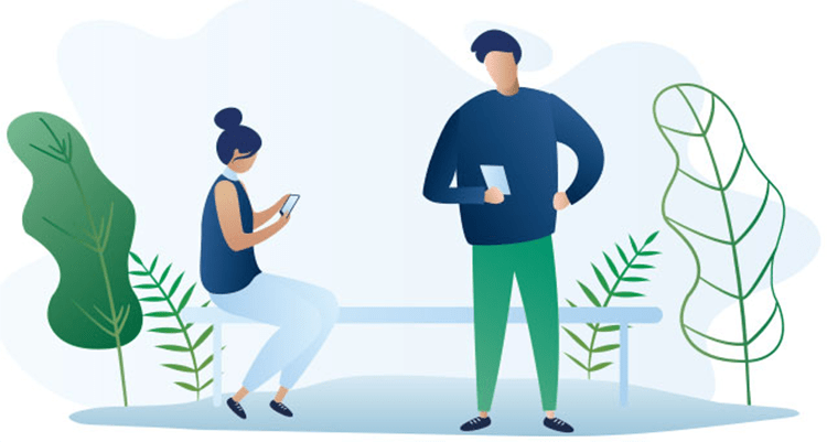 A flat vector style graphic of a man and woman with blue shirts holding their phones near a bench and bushes.